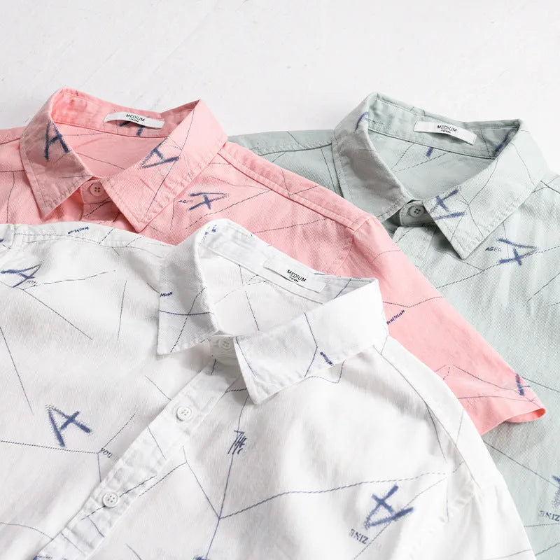 Loose fit pure cotton short sleeve shirt in light green, shown on a model.