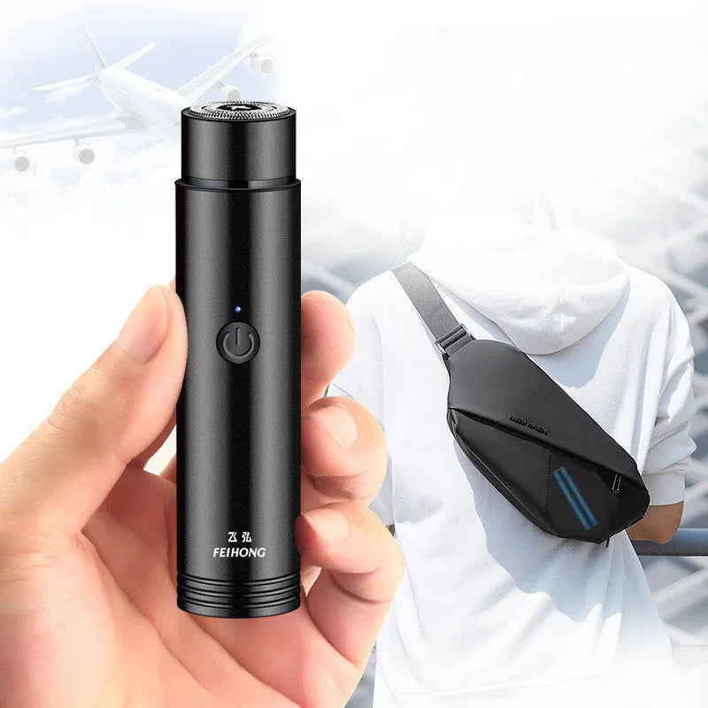A black or blue mini portable electric shaver with a detachable rotary head and USB charging cable.