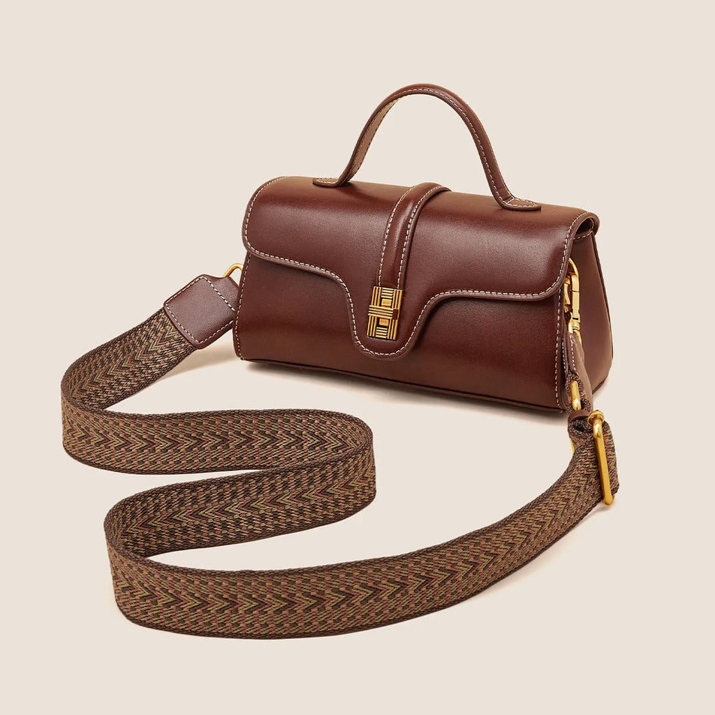 Cambridge-style leather messenger bag in clamshell design with lock detail and internal compartments