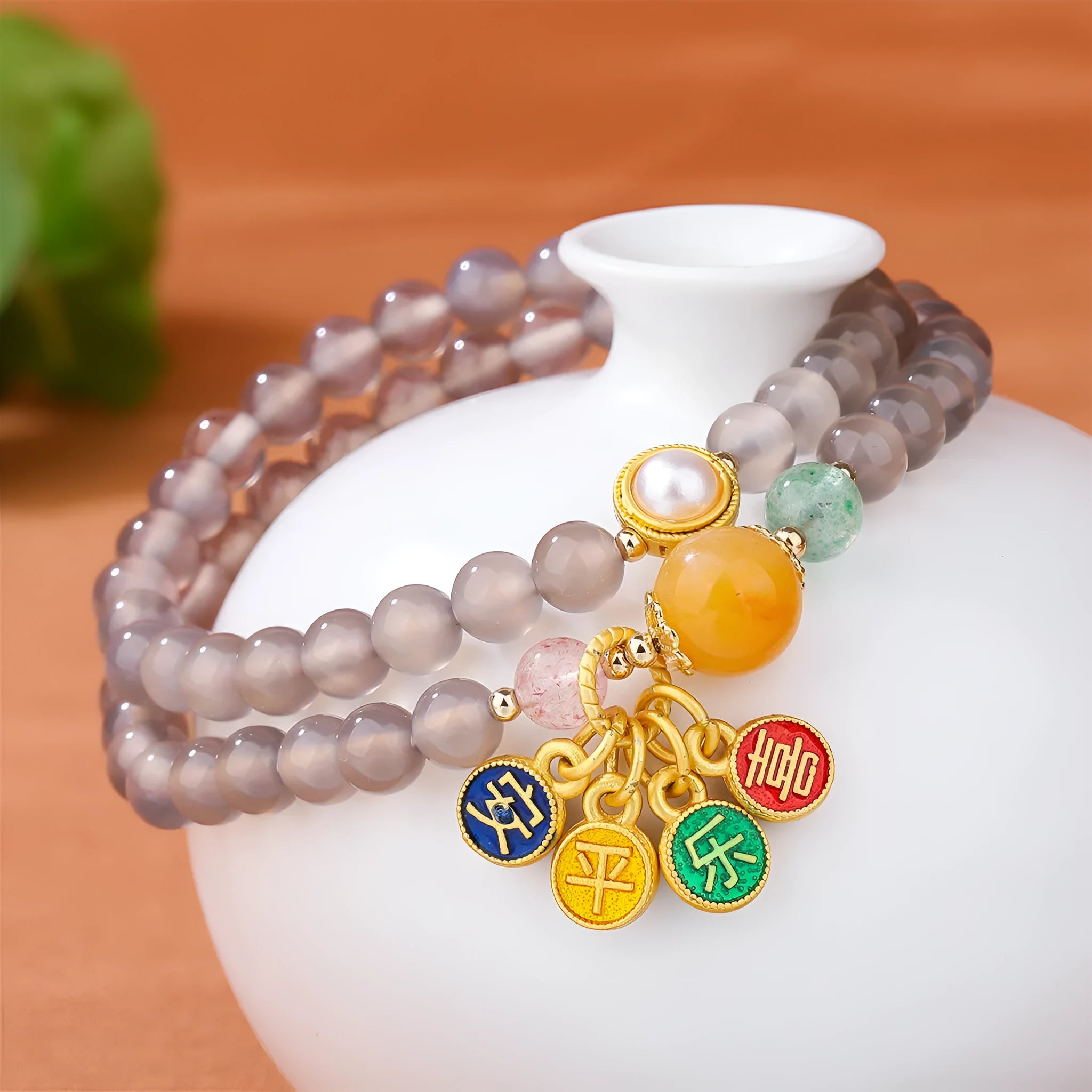 Natural grey agate women's bracelet with two-circle design showing safe and happy symbolism