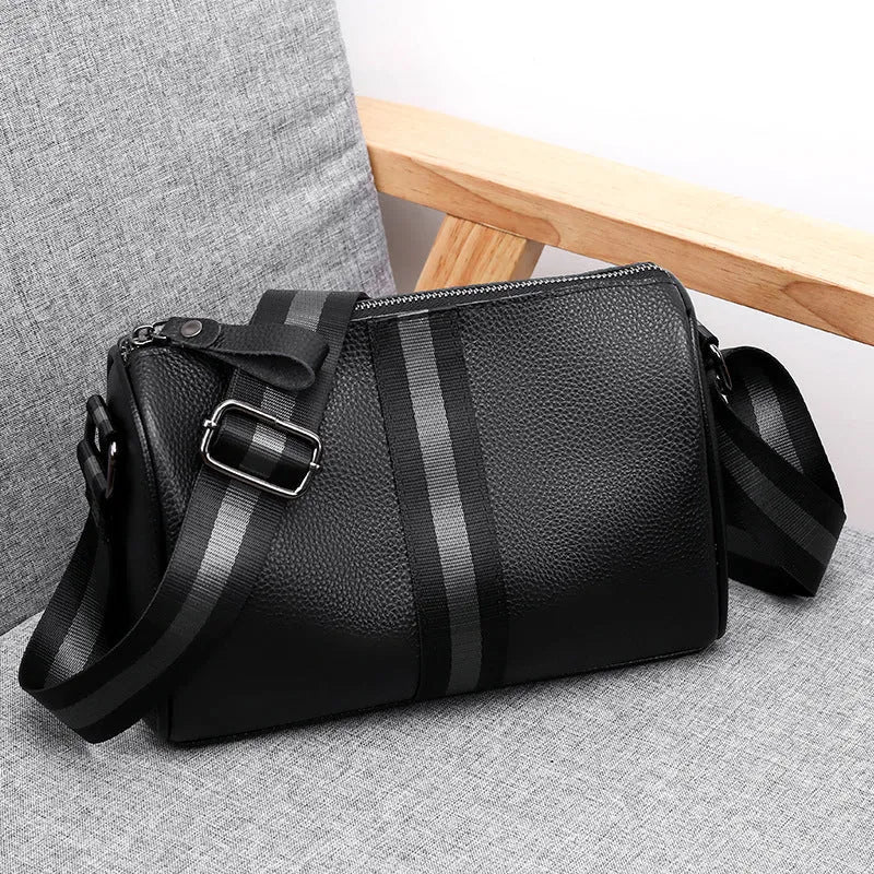Black genuine leather one-shoulder crossbody bag with dimensions 24x16x13cm