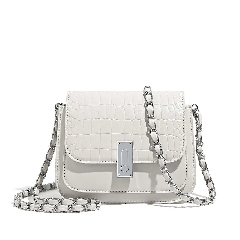 Women's soft PU chain crossbody shoulder bag in black, showing internal phone pocket and outer compartments.