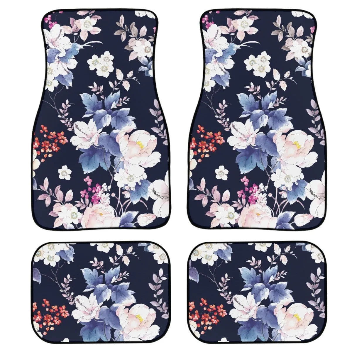 Set of four black printed rubber car floor mats with textured surface, showing thickness.