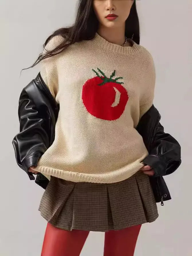 Milky white women's jacquard knit pullover sweater with a round neck and long sleeves on a hanger.