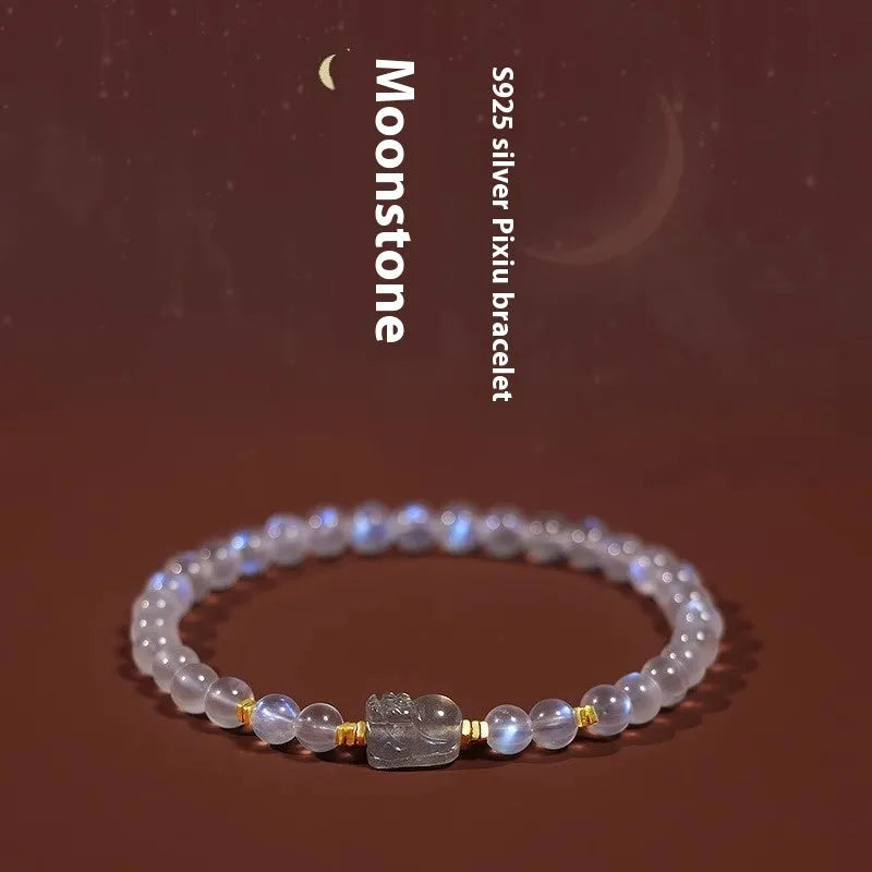 Moonstone bracelet with animal zodiac motif in national style design featuring blue light elements