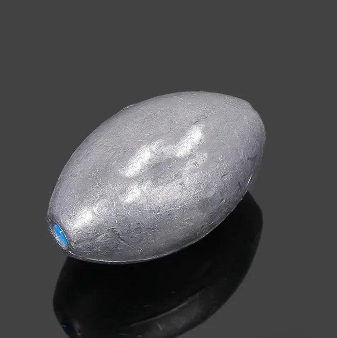 Rugby-shaped sea fishing lead sinker with plastic core in various weights from 10g to 150g