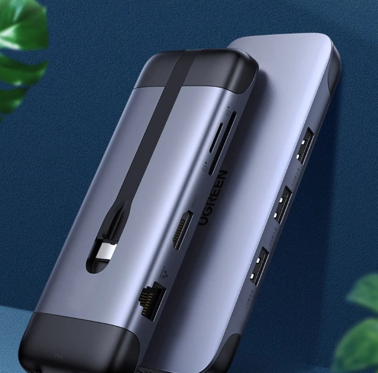 USB-C docking station adapter showing either 5-in-1 or 9-in-1 port configuration on a compact 9cm body.
