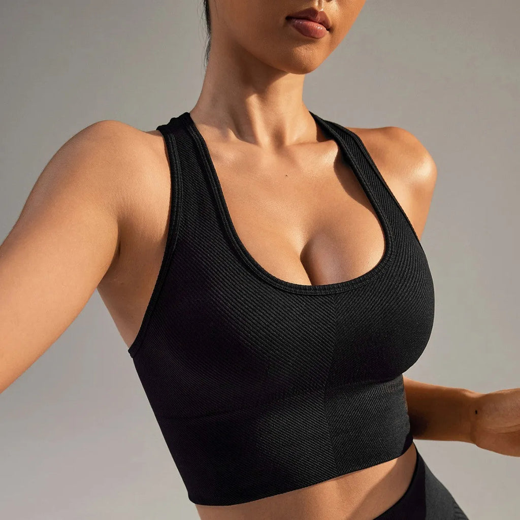 Black sports bra with cross-back design and full cup coverage
