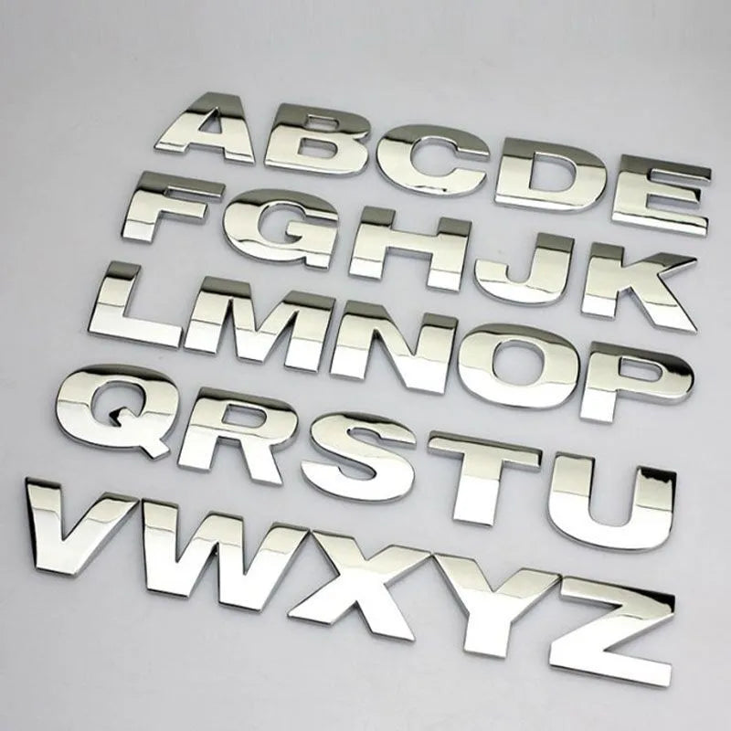 Zinc alloy metal car letter sticker in 3D style, shown in silver finish, approx 2.5cm size.