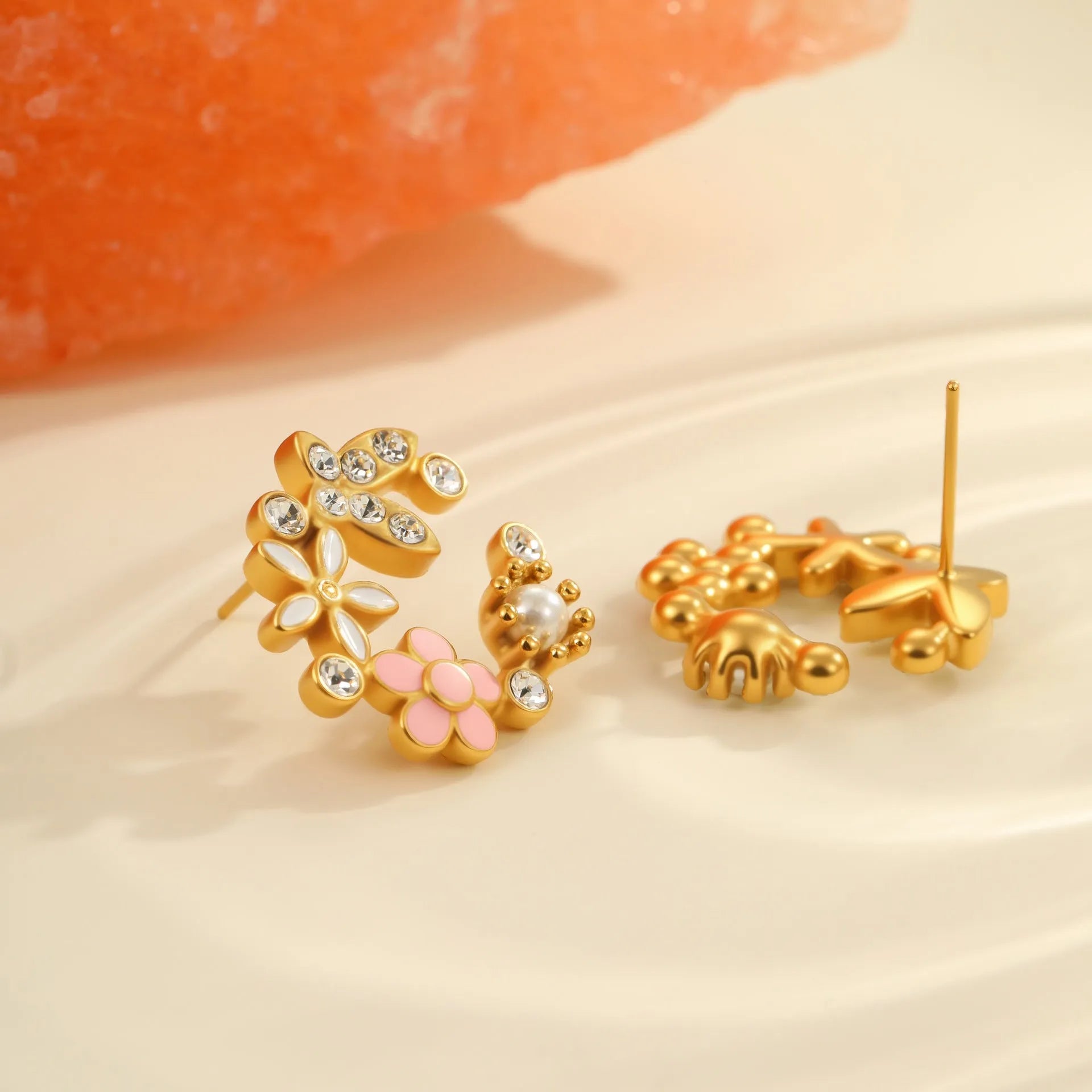 Colourful diamond flower stud earrings with gold plating and petal design