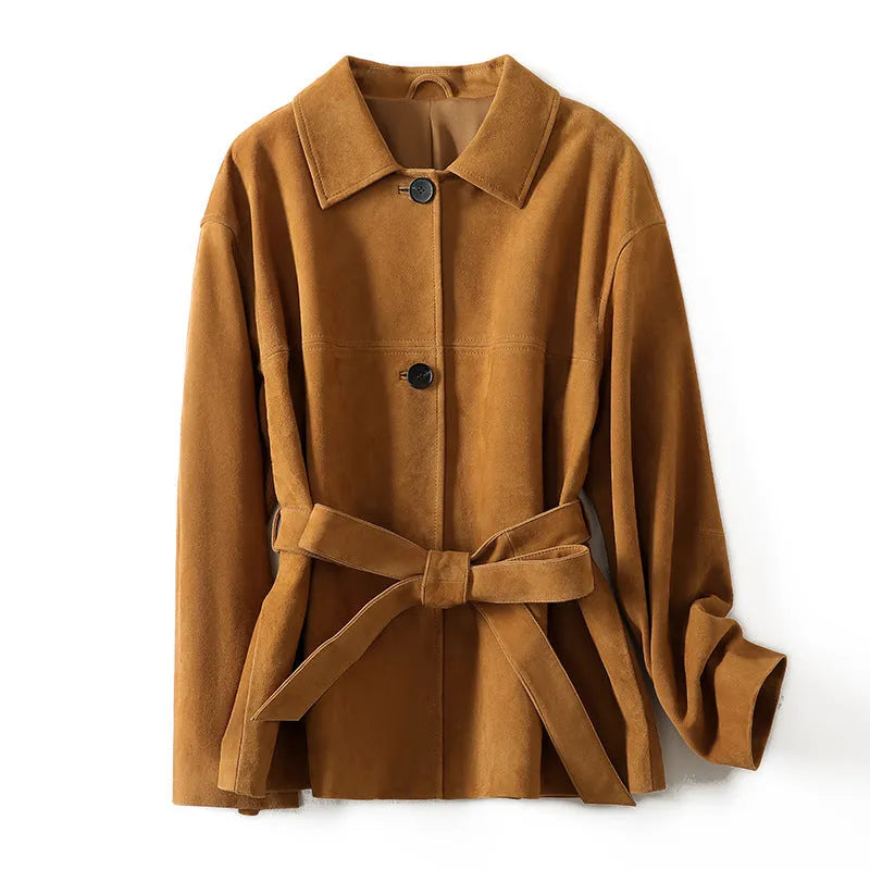 Yellow brown loose fit cashmere coat with a Peter Pan collar and a brown leather belt.