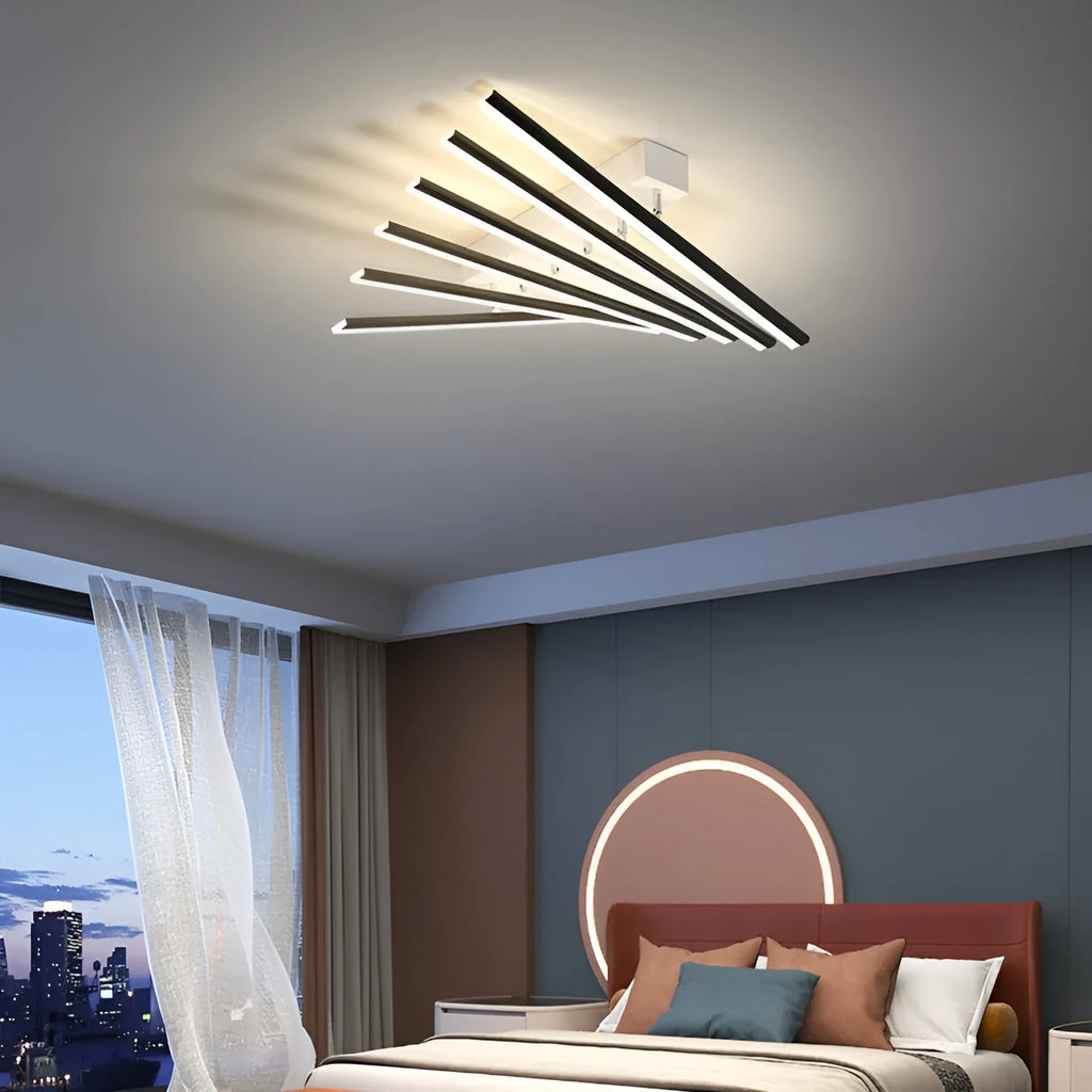 Modern ceramic ceiling light with six wave-style arms in black or gold finish.