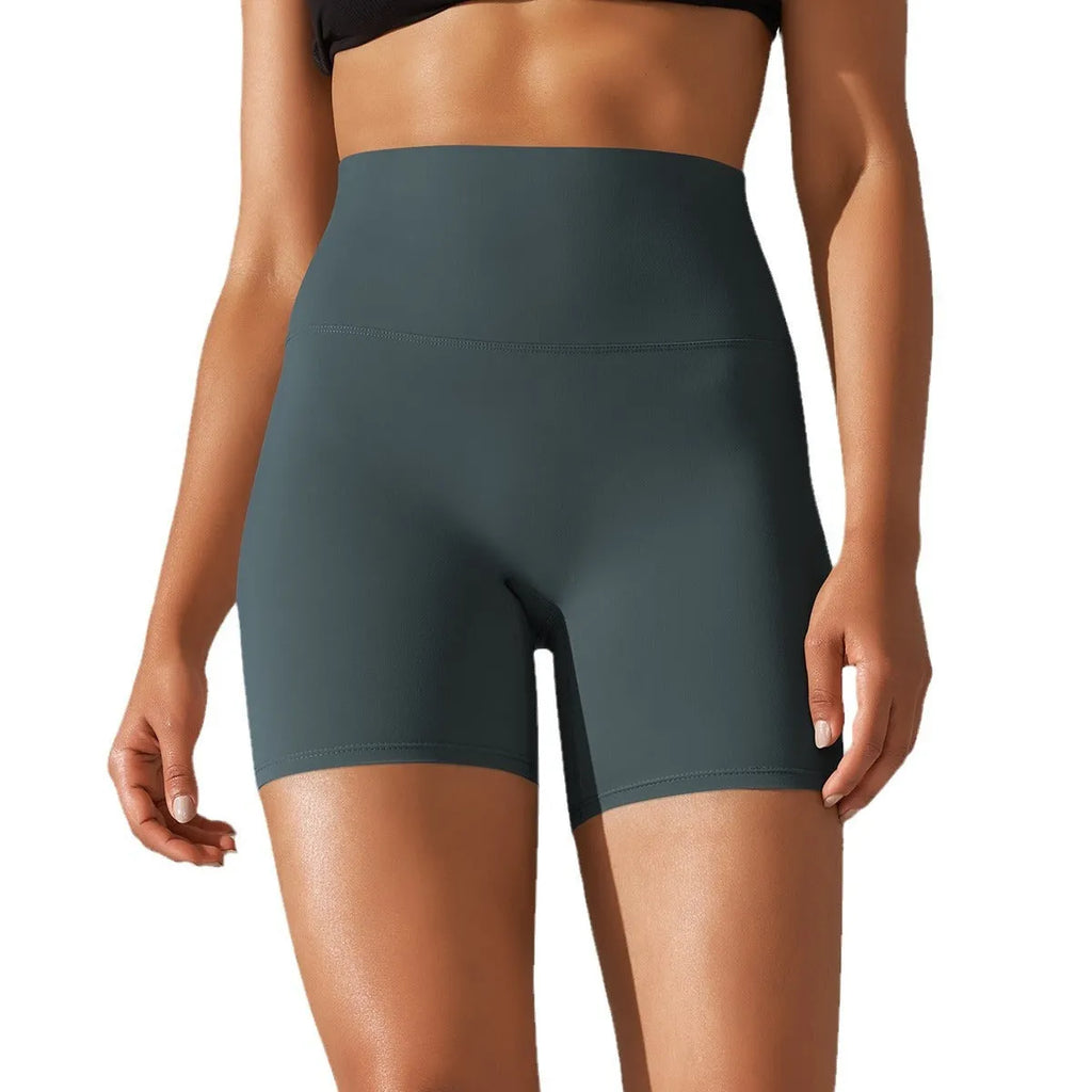 Dark green high waist women's fitness tights made from nylon spandex fabric.