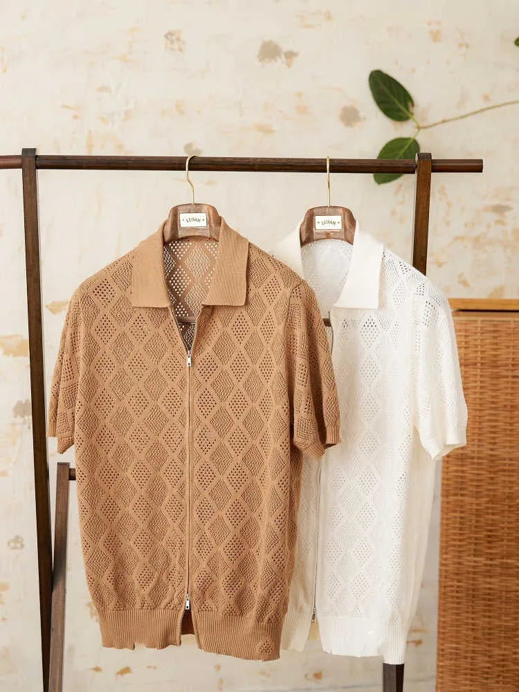Men's light brown cotton cardigan with lapel collar, zipper front, and short sleeves laid flat.