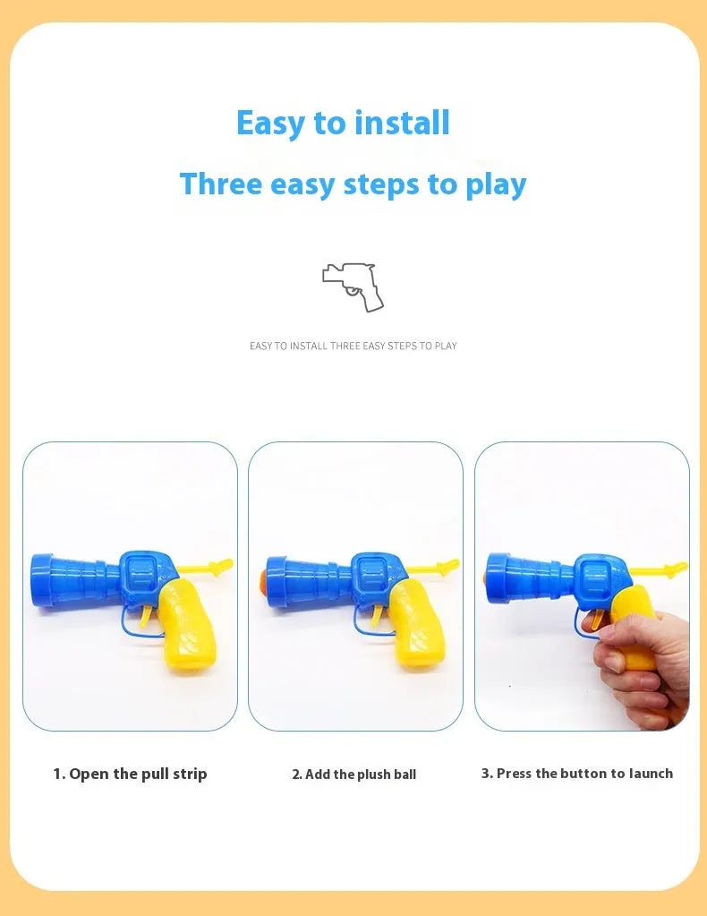 Pet toy launch gun with a selection of soft red plush balls for interactive dog and cat fetch games.