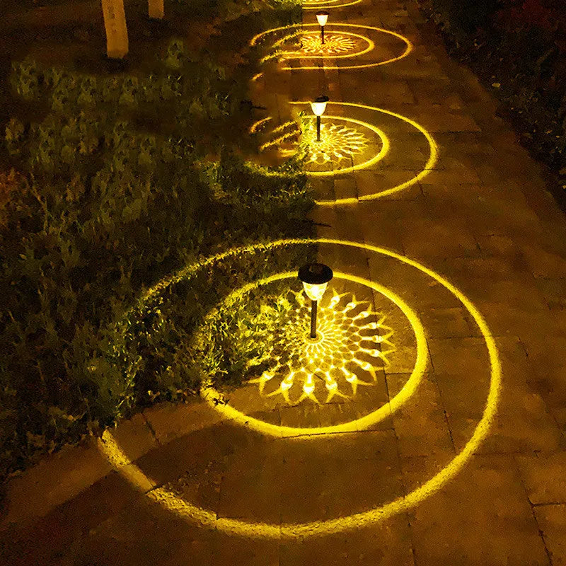 Black solar lawn light with IP55 waterproof rating and polysilicon solar panel for garden pathway illumination