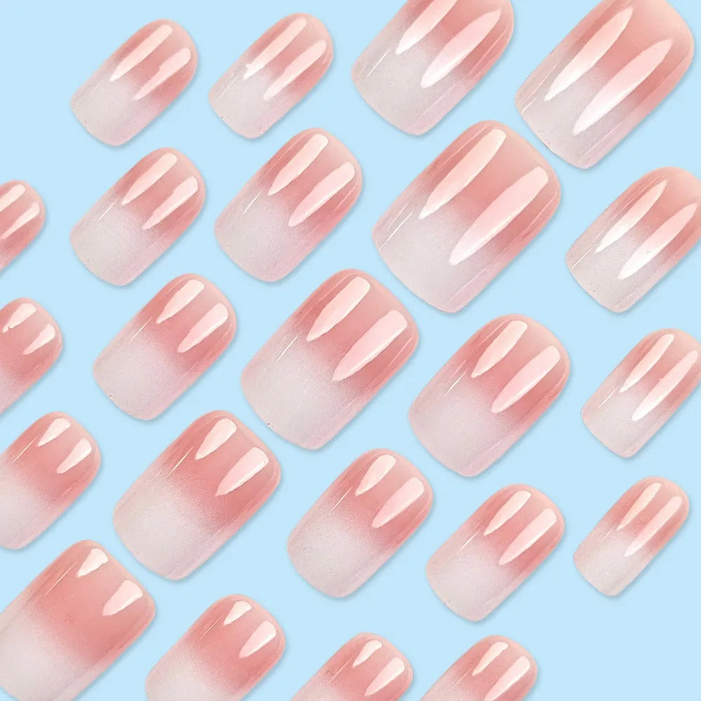 Pink and white gradient detachable nail stickers with starry sky pattern on hands showing medium European square shape