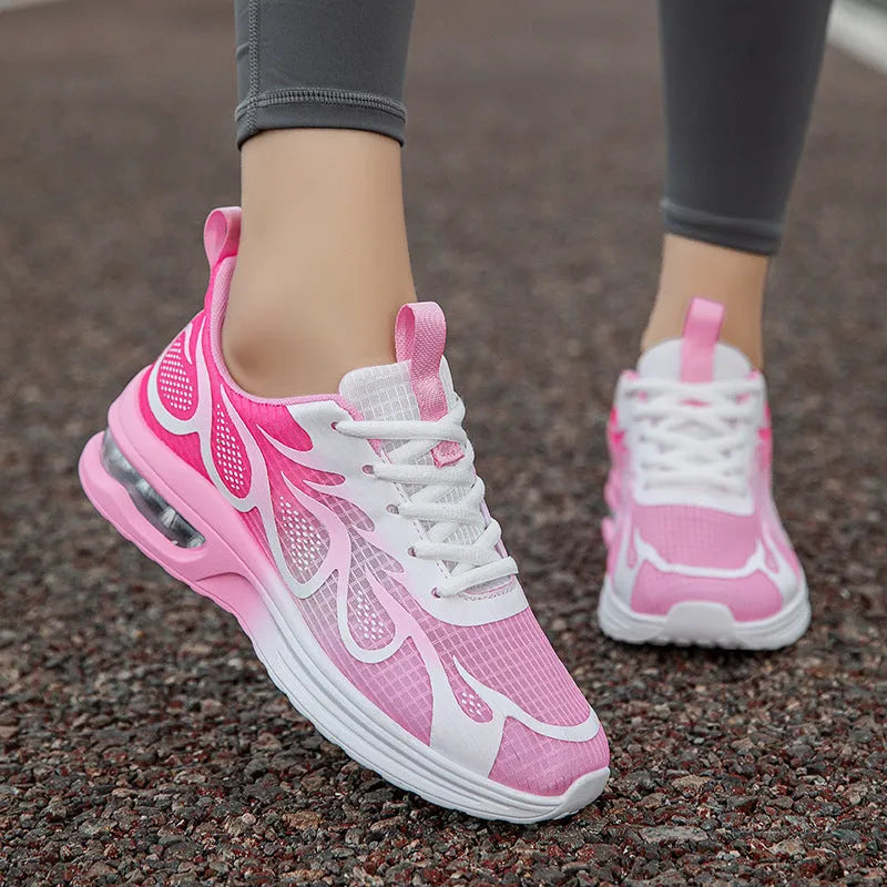 Women's casual sneakers with mesh upper and PU sole in pink, plum red, or moonlight colour.