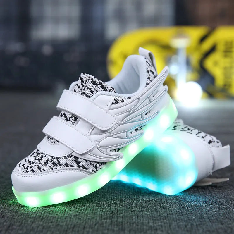 Children's plum red and white LED light-up sneakers with USB charging port.