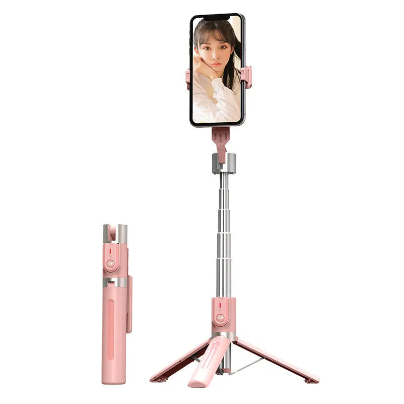 Black aluminium Bluetooth selfie stick with dual fill lights extended on a desktop.