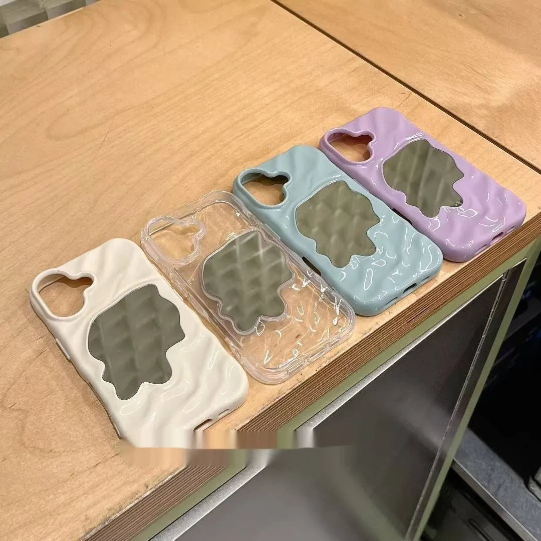 Solid colour iPhone case with a water ripple texture and a reflective mirror back, shown in a beige colour option.