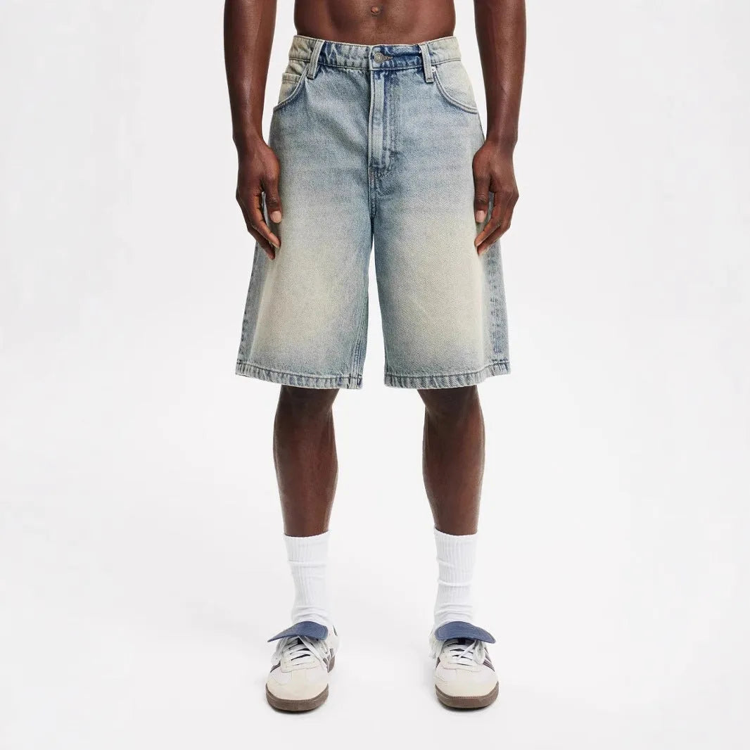 Men's light blue loose fit straight leg denim jeans showing front and back view