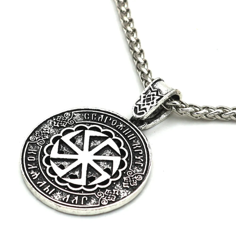 Close-up of Lunavin ODing logo pendant on an antique silver snake bones chain with leather rope alternative.