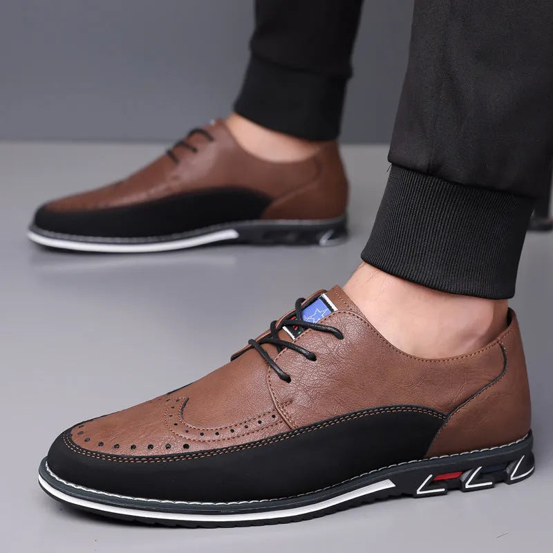 Men's leather slip-on casual shoes in black, gray, khaki and orange colours with low-top design