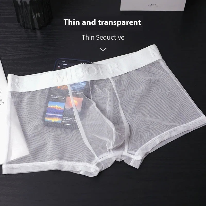 Men's thin invisible boxers in polyester knitting fabric, shown in black, white, sapphire blue, skin tone, green and pink colours.