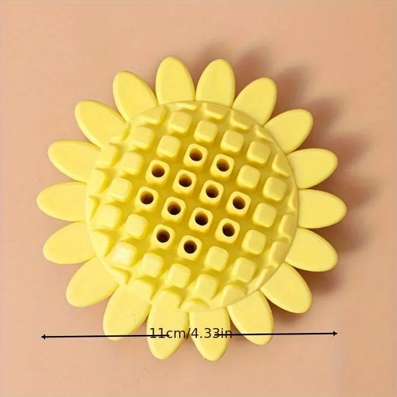 Yellow rubber sunflower-shaped dog toy for teething puppies and chewing play
