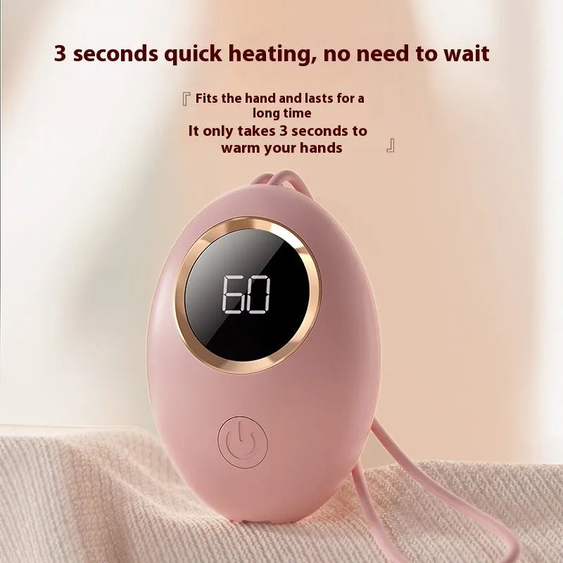 USB-powered hand warmer with digital display, showing girl pink colour option.
