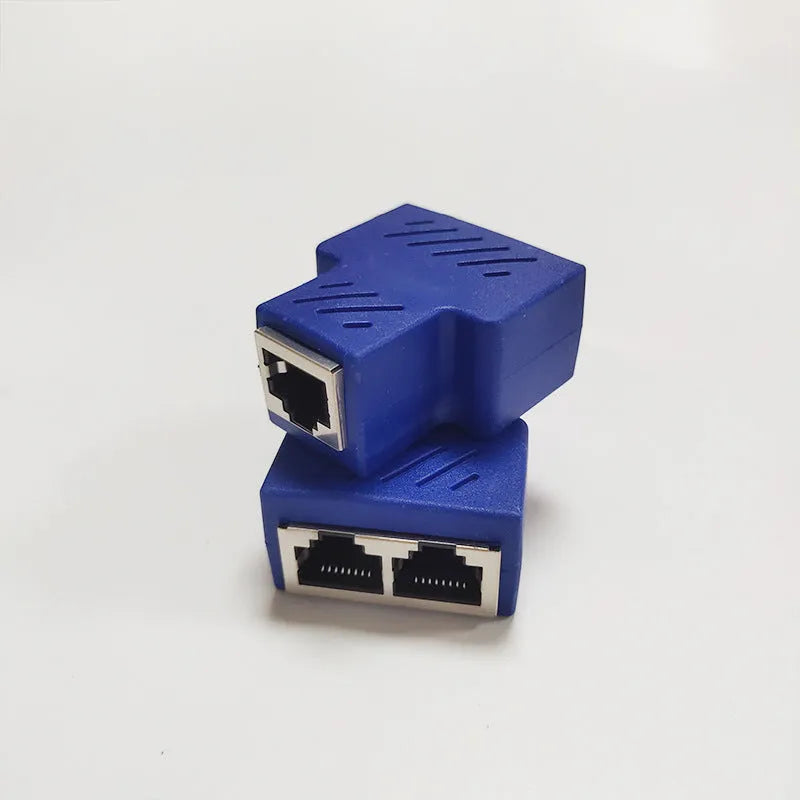 Two white RJ45 network cable splitter adapters showing one male and two female Ethernet ports.