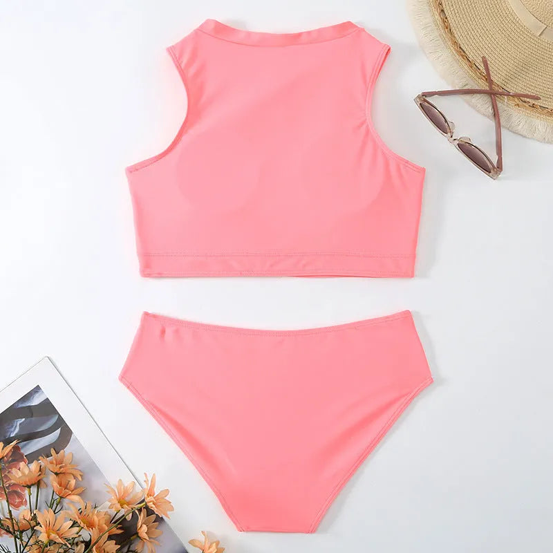 Pink high waist split leg bikini swimsuit with mesh lining on mannequin