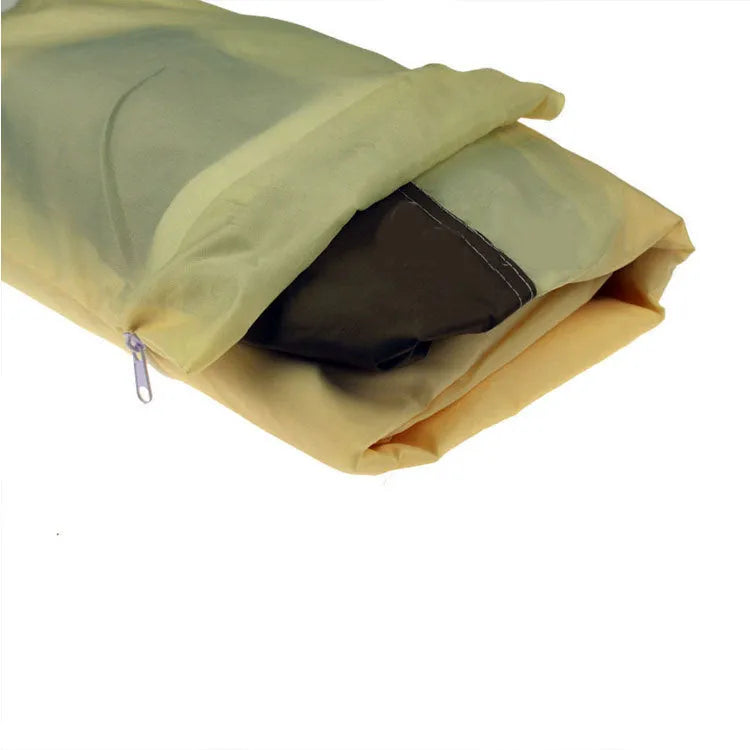 Beige ribbed polyester barbecue cover shown draped over a garden grill in a Nordic style.