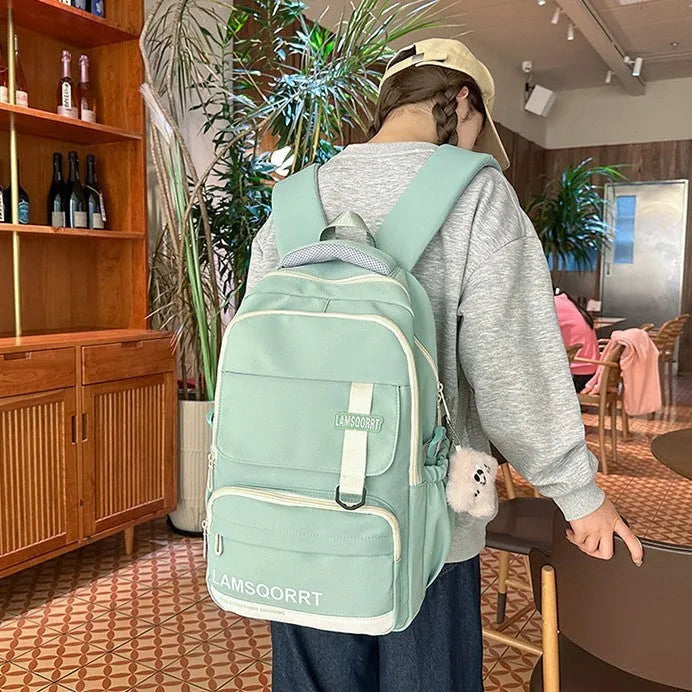 Waterproof nylon high school student backpack in multiple colours with pendant options