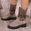 Women's black suede chunky heel snow boots with lace-up design and fleece lining.