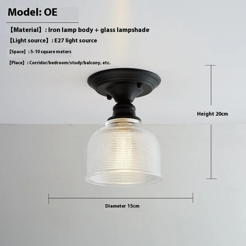 American retro single-head ceiling lamp with clear glass shade showing exposed filament style