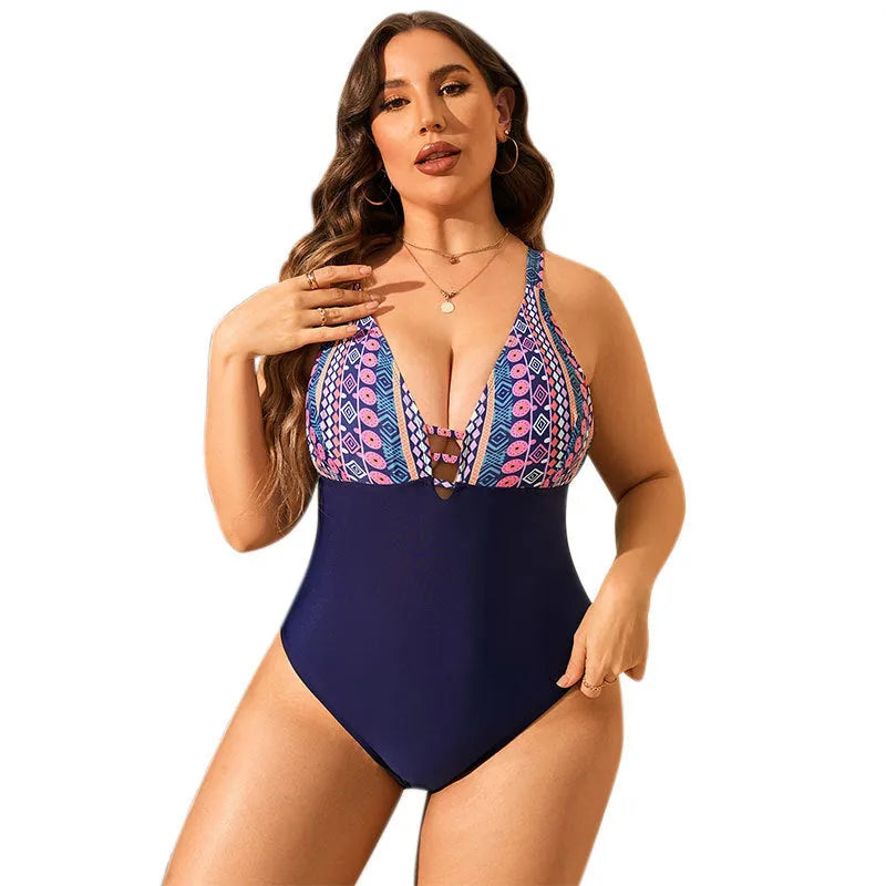 Leopard print plus size one-piece swimsuit for women with V-neckline and sleeveless design.