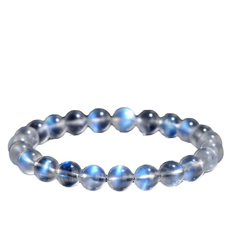 Natural cream body blue moonlight crystal bracelet showing grinding treatment details