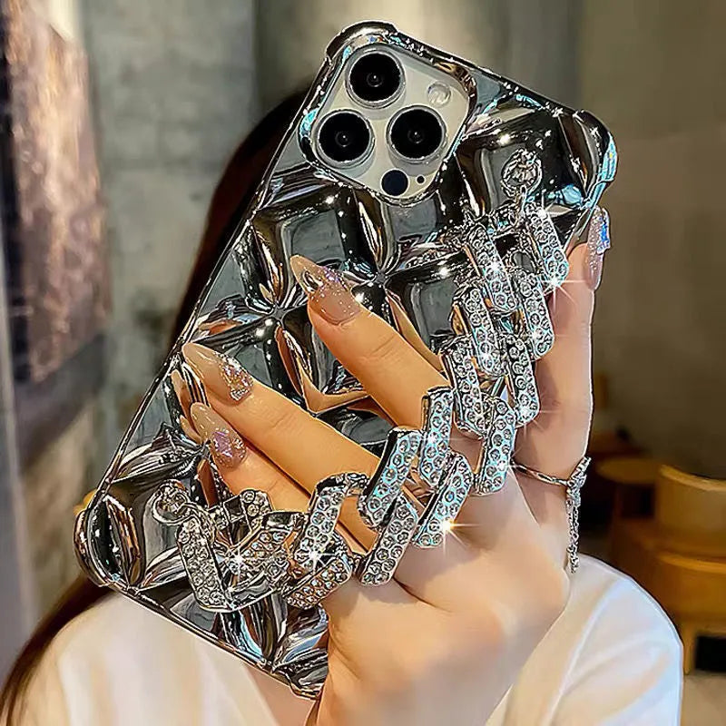 iPhone phone case with attached diamond bracelet chain in gold and silver plated rhombus designs