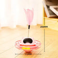 Pink cat tumbler turntable toy measuring 17 x 10 cm for interactive play