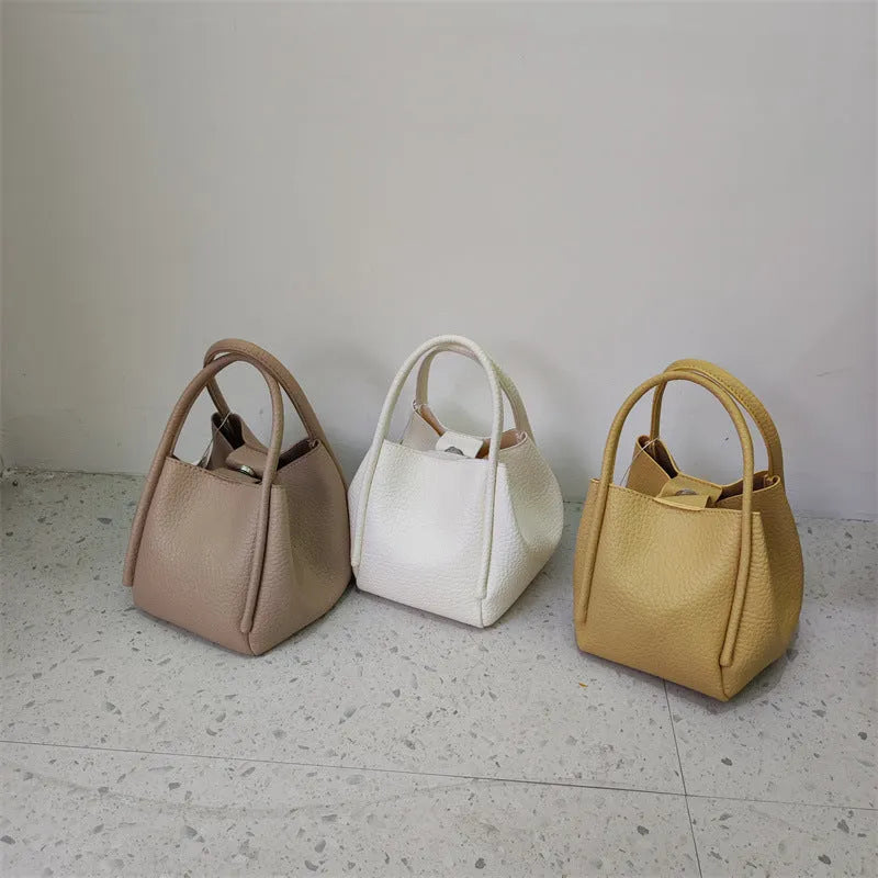 Retro PU crossbody bag for women, soft bucket shape, measuring 19x15x13 cm, in apricot colour