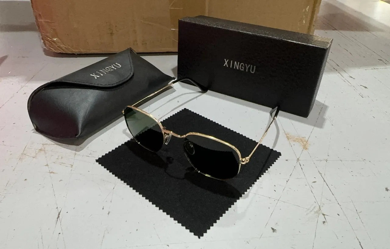 Classic round-frame retro sunglasses for men in black, shown from the front.