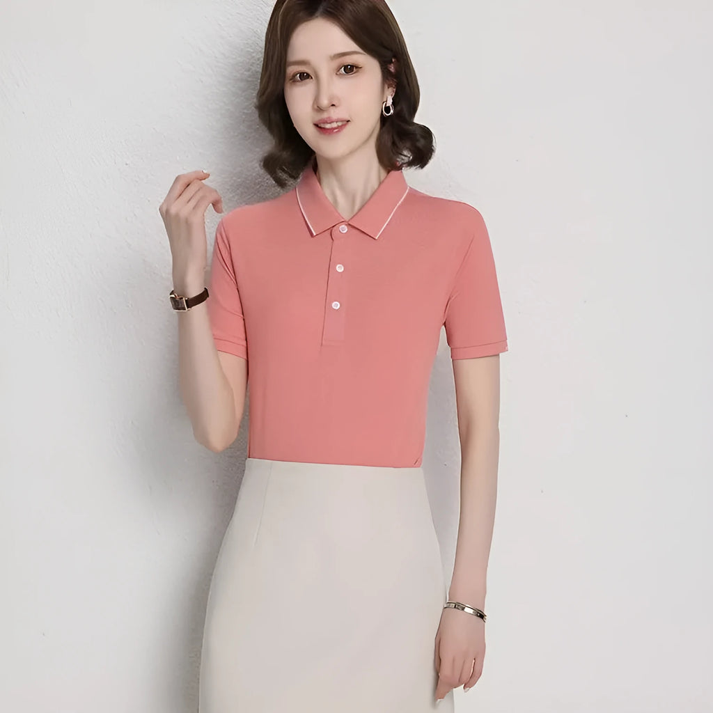 Loose fit cotton blend short sleeve polo shirt showing single-side colour secondary collar lapel detail.