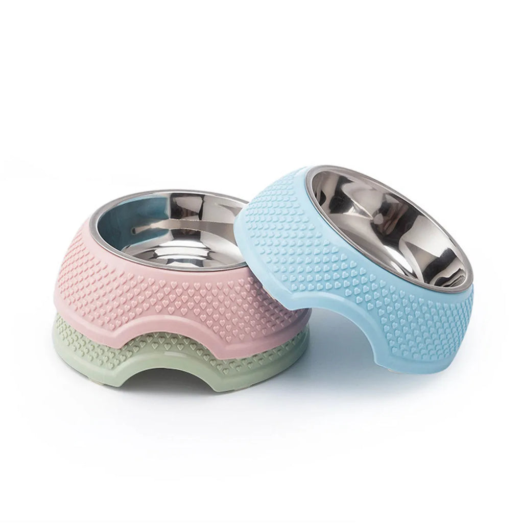 Set of four stainless steel pet bowls in blue, green, and pink colours on a non-slip base
