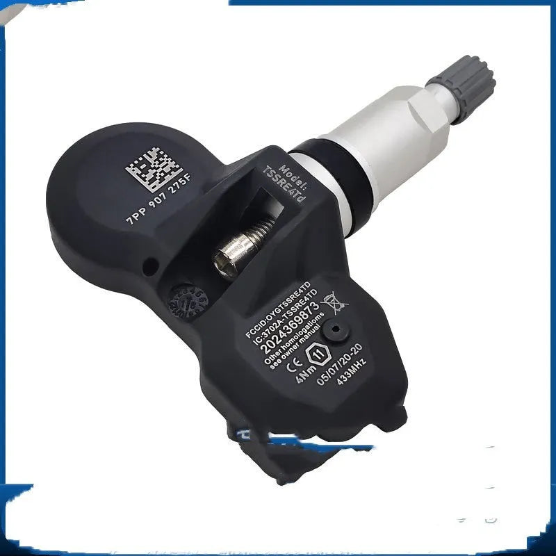 Black tyre pressure monitoring unit for Audi vehicles showing electronic components
