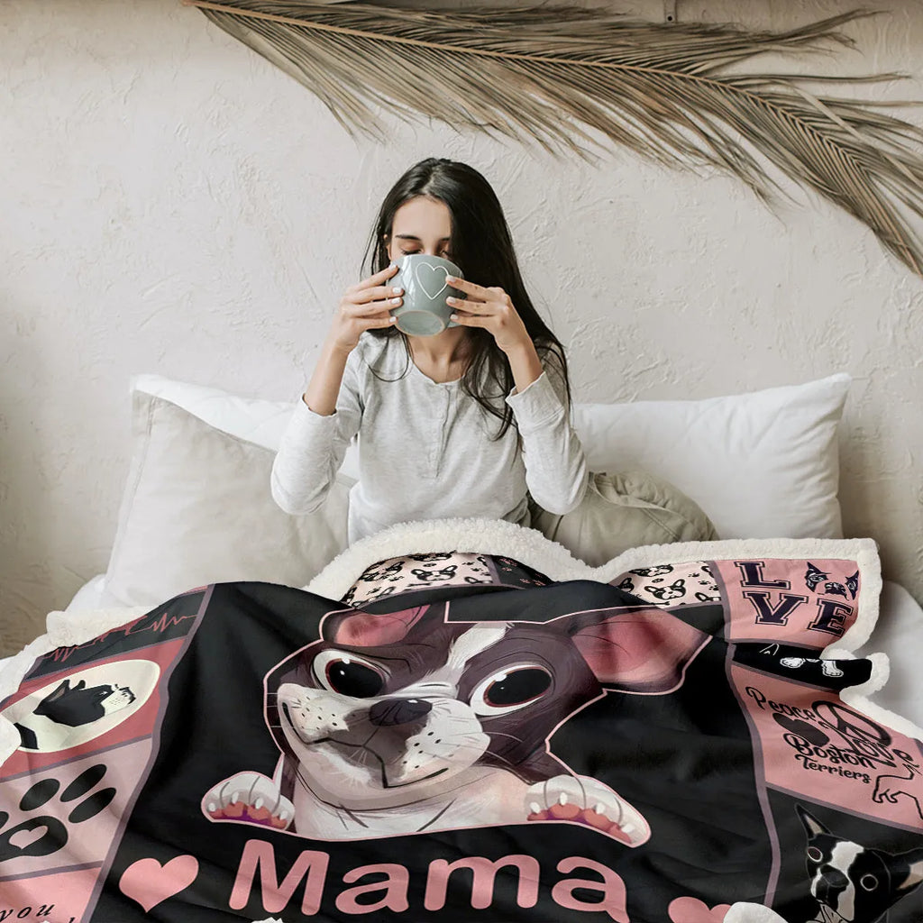 Pink Sherpa fleece dog themed throw blanket on sofa with hemmed edges