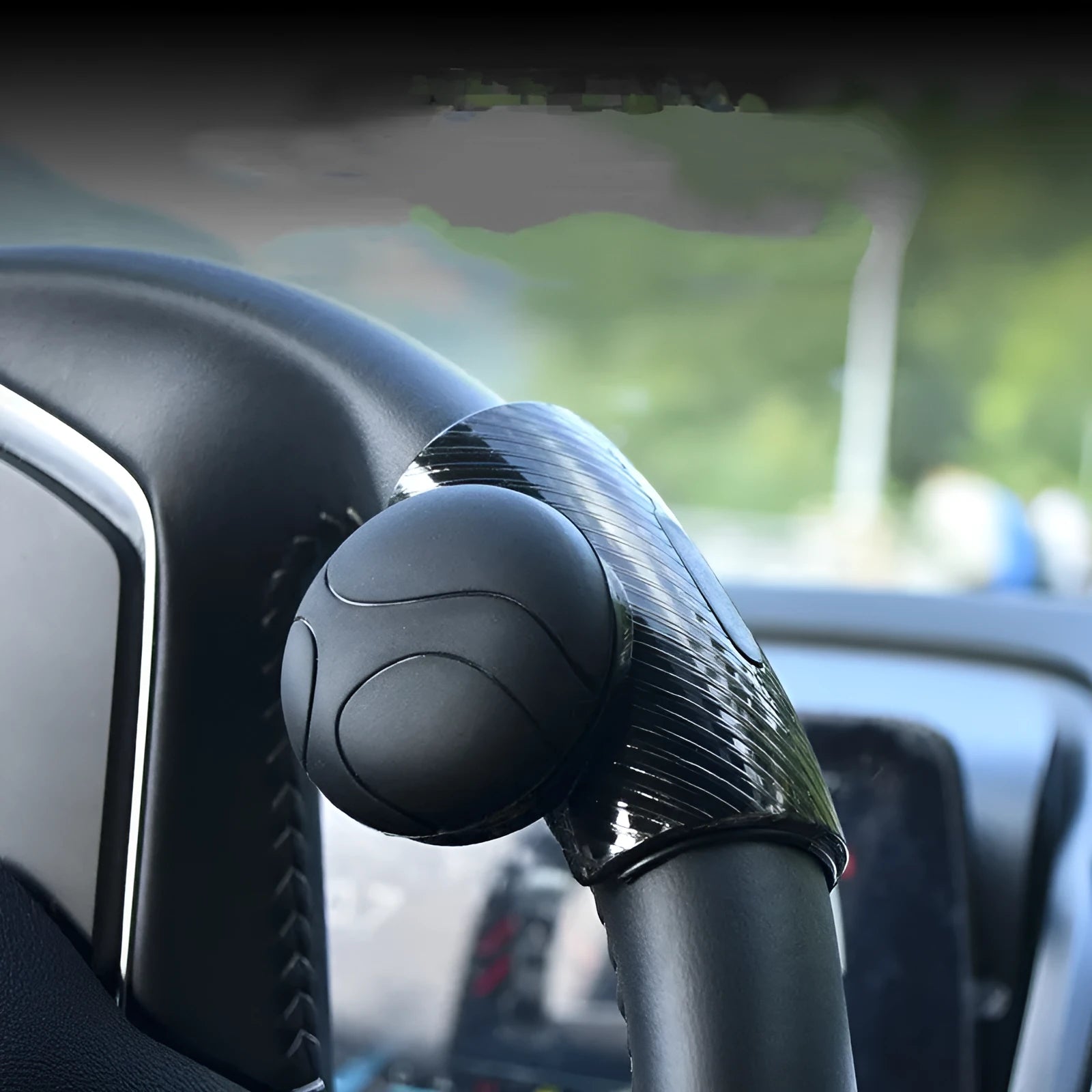 Steering wheel assist ball with silicone construction and metal bearing booster for single-hand driving