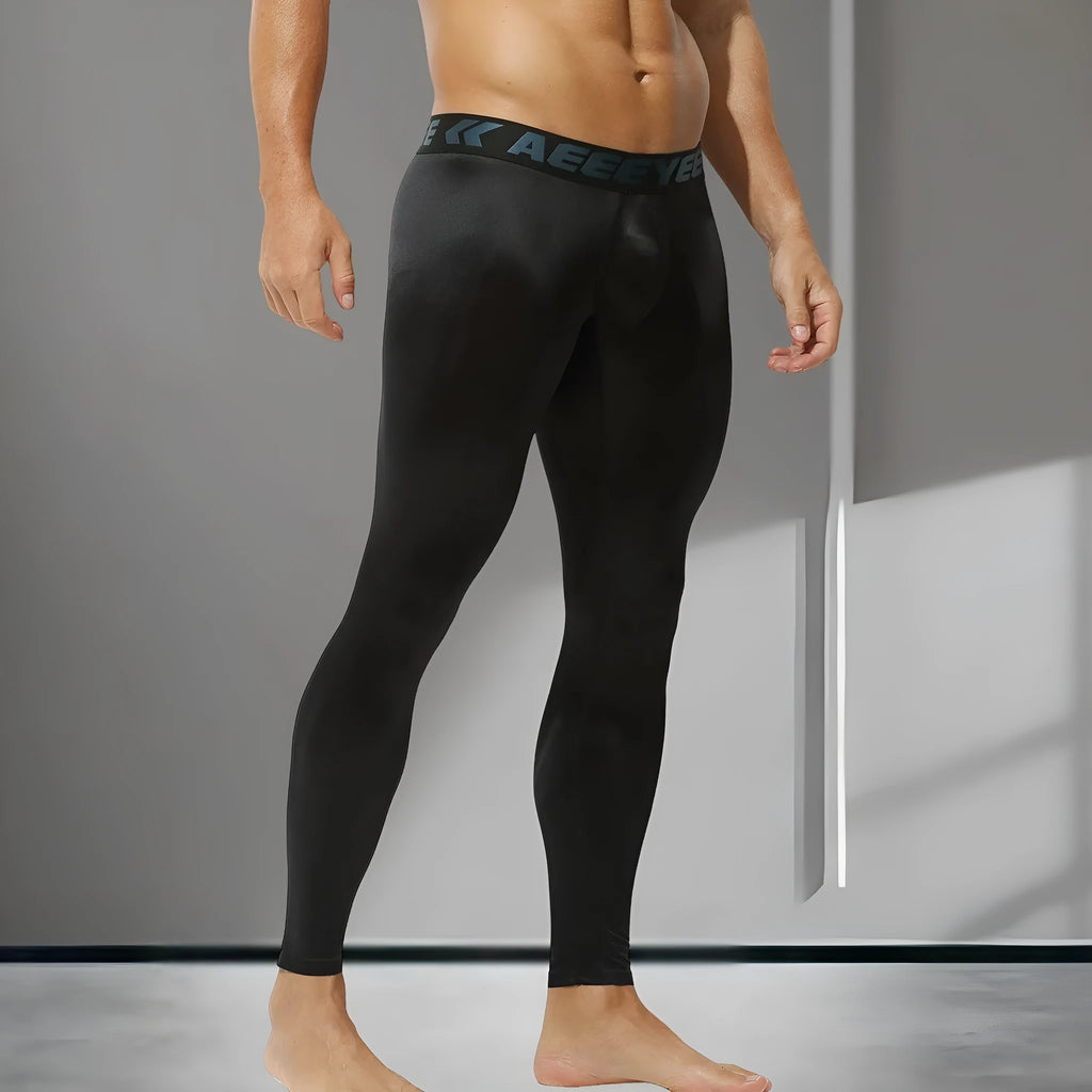 Men's ultra-thin thermal pants in black with low waist slim fit stretch nylon spandex fabric