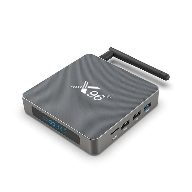 Android Smart Voice Set-top Box with remote, HDMI cable, and power adapter on a table.